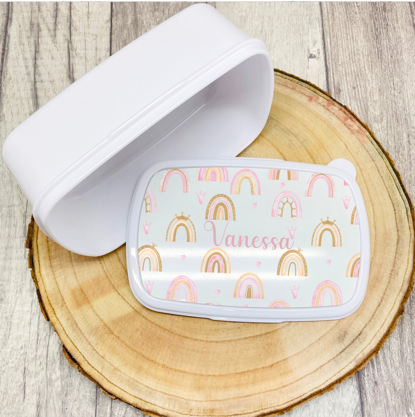 A lovely plastic solid lunch box to keep sandwiches safe in the school or nursery bag. Printed with pretty rainbows and a name this is perfect for packed lunches.