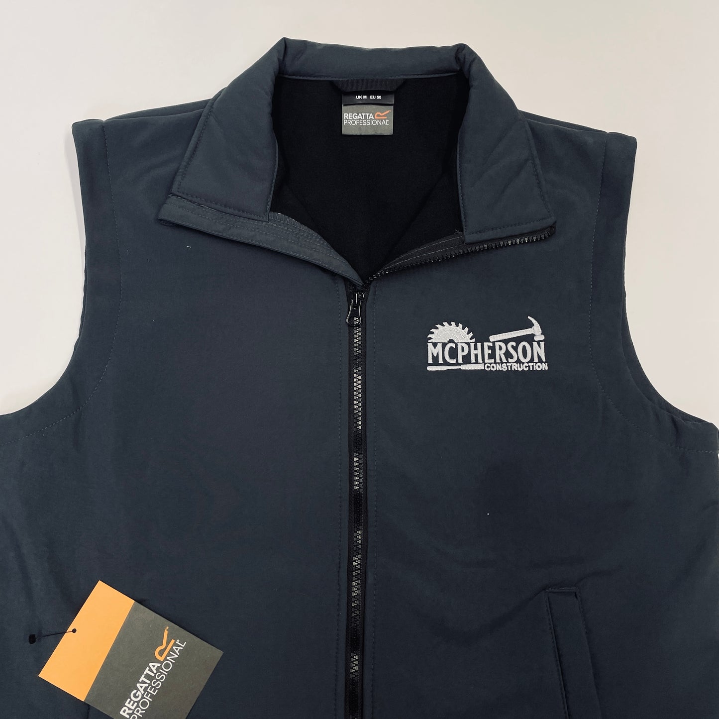 This is a soft shell gilet embroidered with a business logo. These are suitable for any occasion or duty at work keeping your arms free and your body warm.