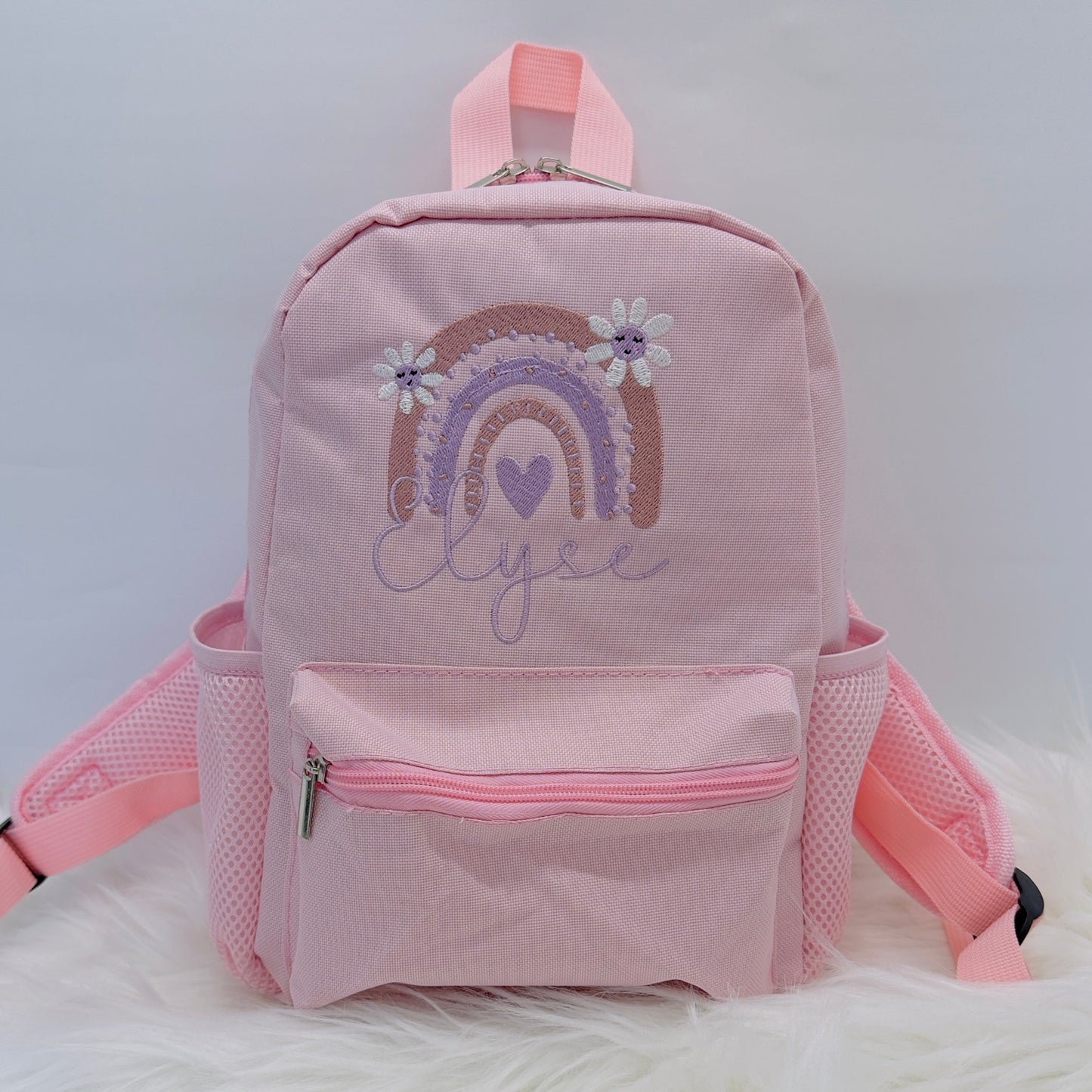 Personalised Kids Nursery or School Rucksack with Embroidered Rainbow and Flowers