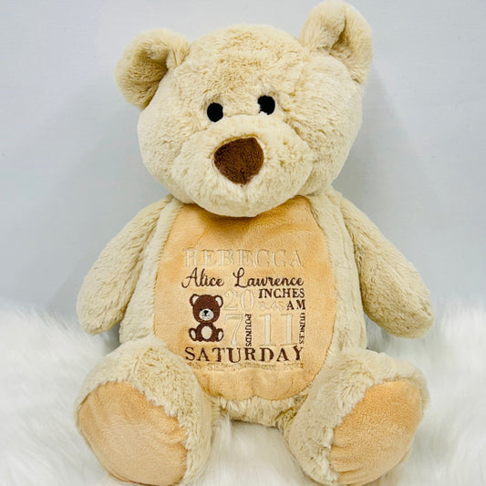 This is a gorgeous brown teddy bear. The bears belly is embroidered with a new babies birth details - date, name, weight etc. This is a lovely nursery accessory and a keepsake to cherish for years