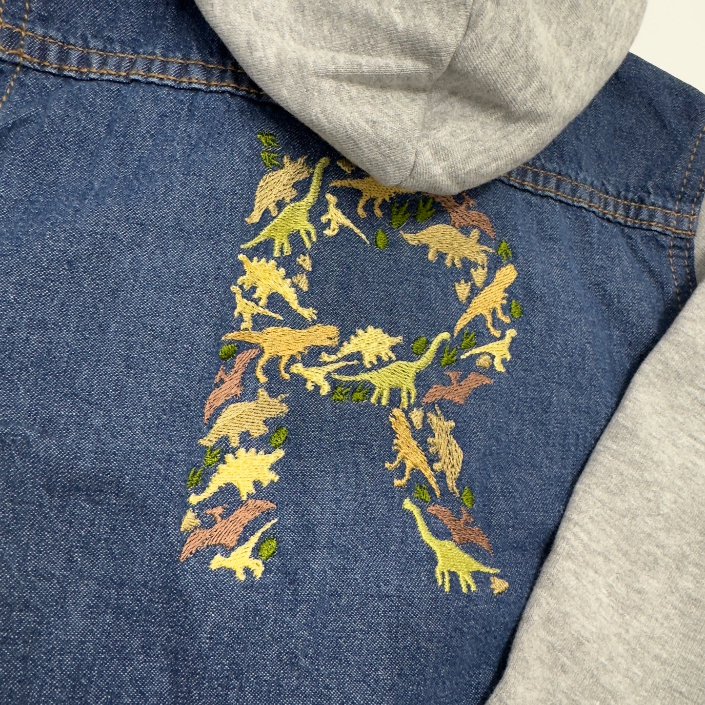 Dinosaur Initial Embroidered Personalised Denim Jacket - Button Closure, Cotton Sleeves and Hood