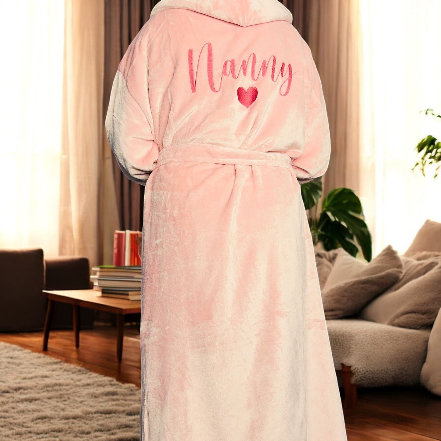 Indulge in ultimate comfort with our super soft luxury robe!
Featuring two front pockets, cuffed sleeves, and a cosy sherpa-lined hood, this robe is perfect for lounging.
Personalise this with a name embroidered on the back for a truly unique touch.
Treat yourself, Mum, Dad, Grandma or any loved one to this luxurious robe today!
Available in four different colours - Pink, Silver, Charcoal or Navy.
With Various designs to choose from too. Simply choose your design number then enter your name in the personal