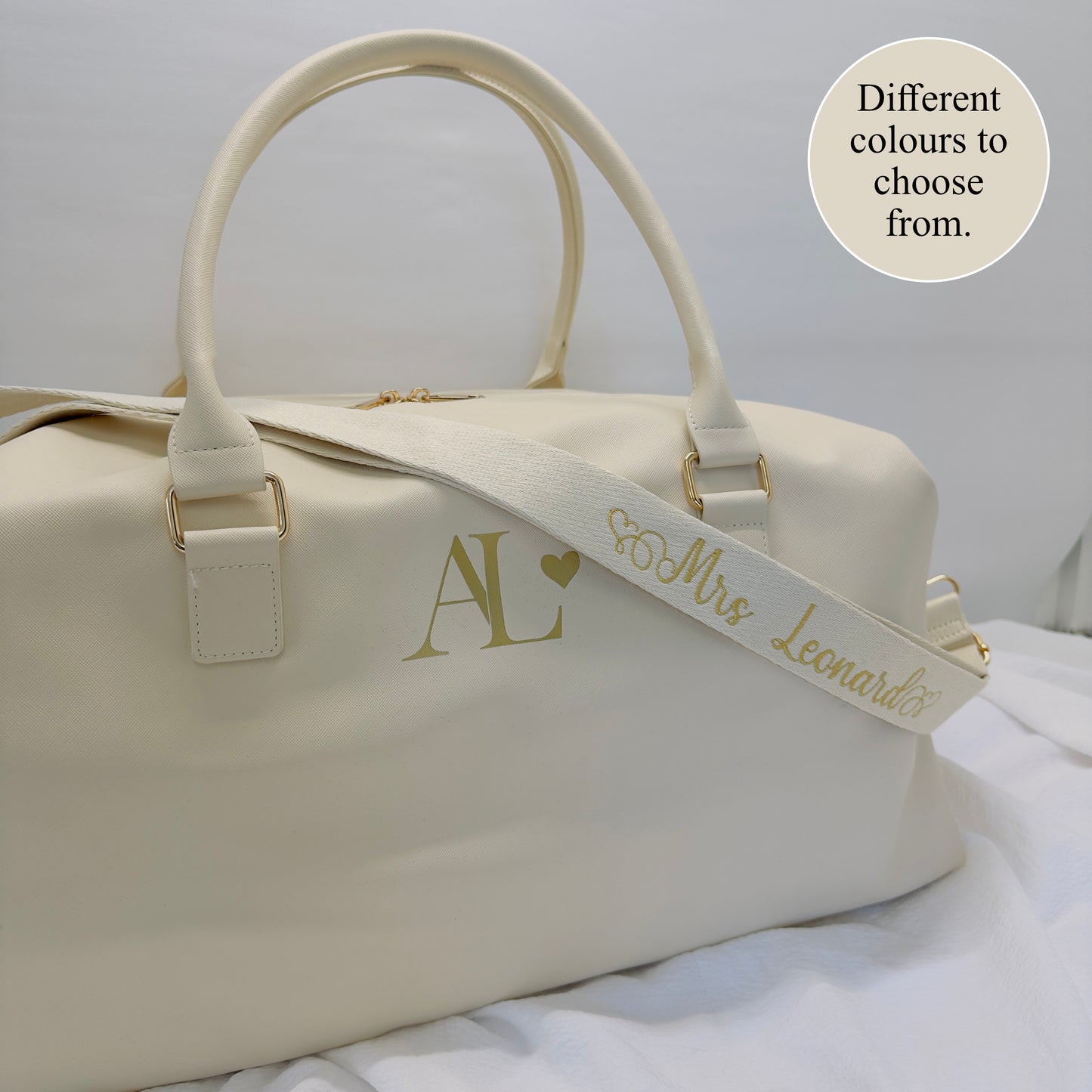Upgrade your travel style with this exquisite boutique honeymoon weekender holdall.
Custom embroidered with your married name on the strap and featuring printed initials on the bag, this personalised piece is both practical and luxurious for your wedding day.
Perfect for a romantic getaway or a weekend adventure.
Featuring an adjustable, removable shoulder strap, a high shine metal gold zip and available in five different colours.
