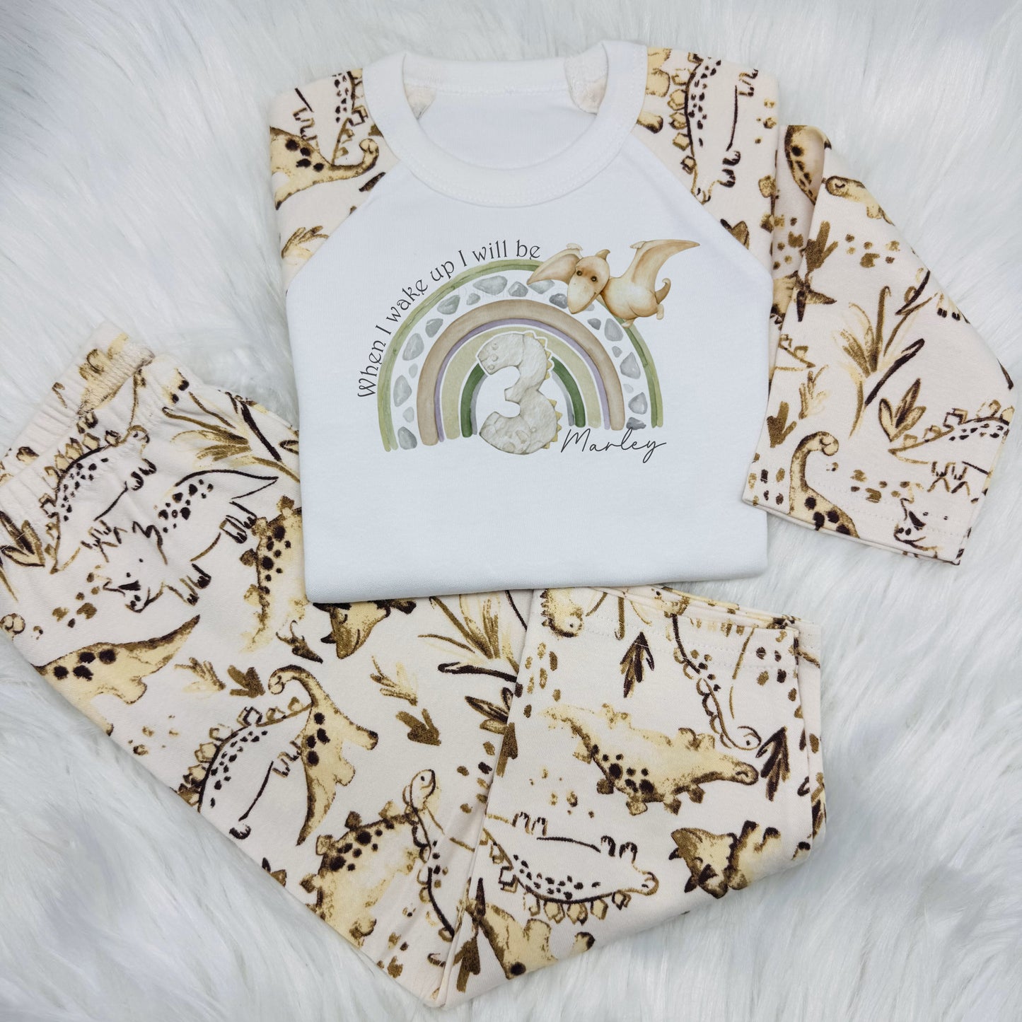 Get your little one ready for a roar-some birthday morning with this personalised children's outfit!
The 'When I Wake Up I Will Be' design features a playful dinosaur, a reptile rainbow, and space to add their age.
Printed to perfection, this outfit is the perfect way to make their special day extra memorable!
These are super soft, long sleeve top and bottom and 100% cotton.
Please take a look at the size guide in the photos before ordering.