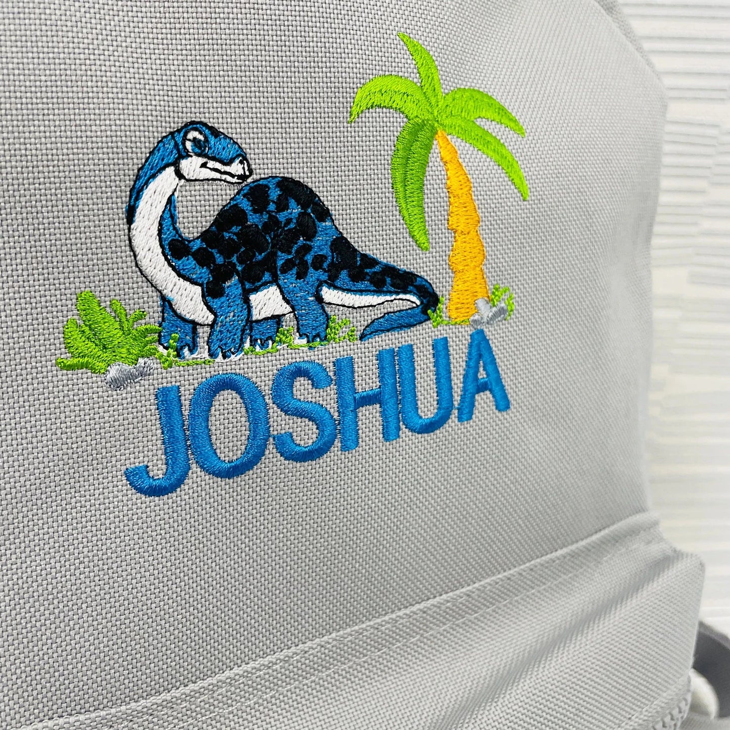 Adorable Baby Dinosaur Embroidered Backpack for Kids - Personalised Nursery or School Bag