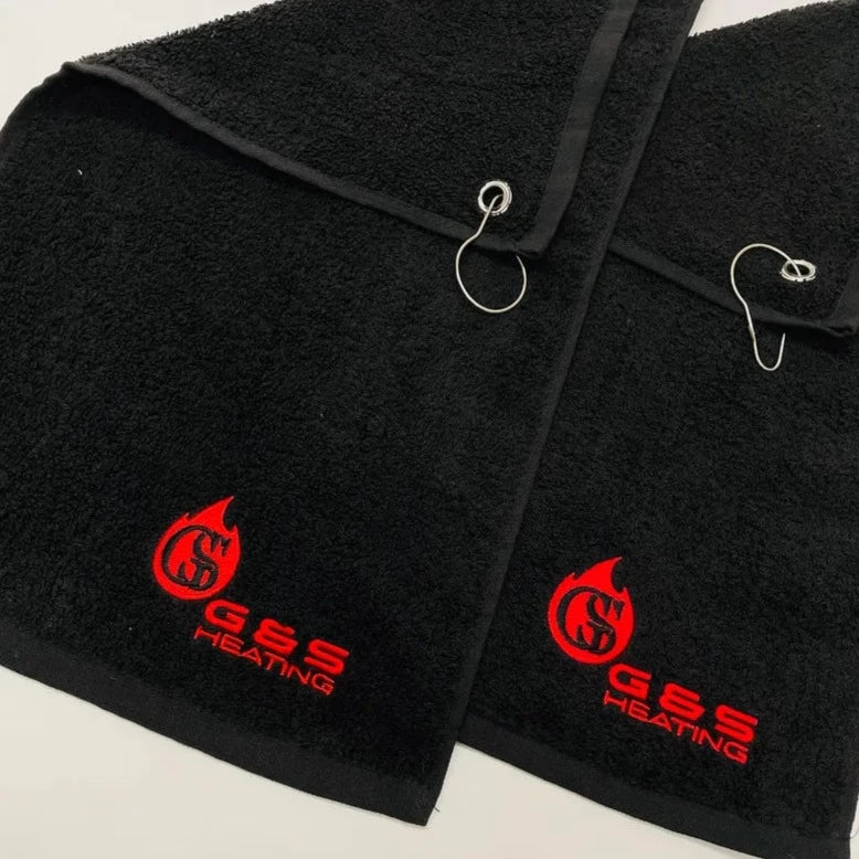 This is a 30x50cm towel with a hook to hang on your trousers or work bag. This is used to wipe grubby hands on to save your trousers from getting too dirty. Each towel is embroidered with a business logo or business name.