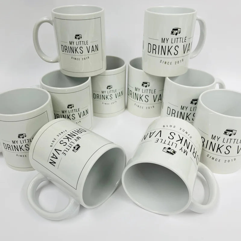 This is a white mug printed with your business logo. Depending on the size of the logo it can be printed all the way around or as an individual image on either side of the mug.