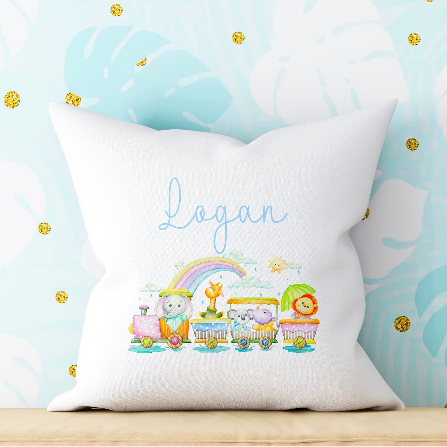 This is a bright & fun design of little zoo animals all in a train under a beautiful rainbow. Personalised with a name in blue, this cushion makes a great accessory for a bedroom or nursery. These 40x40cm soft cushions arrive with inner too.