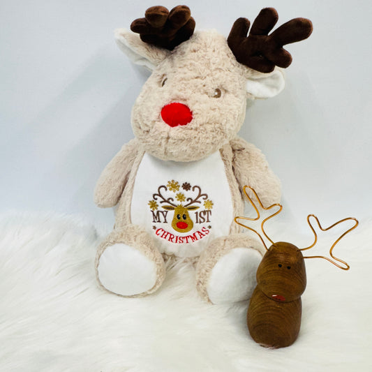 Giant reindeer teddy with its belly printed beautifully. The print features a reindeer face with my 1st either side and the word Christmas below. Amongst the reindeers antlers there’s golden snow flakes