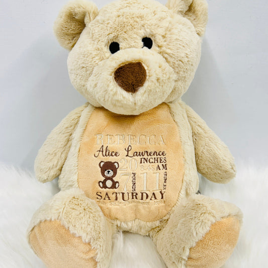 This is a gorgeous brown teddy bear. The bears belly is embroidered with a new babies birth details - date, name, weight etc.  This is a lovely nursery accessory and a keepsake to cherish for years