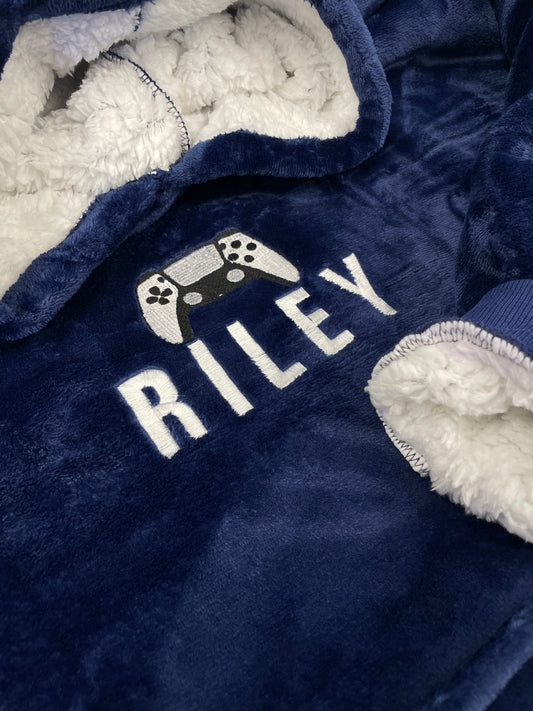 This is an oversized hoodie which is extremely warm and comfortable. Embroidered on the chest is a name and a picture of a gaming controller. Available in different colours this is a fantastic gift idea for all ages.