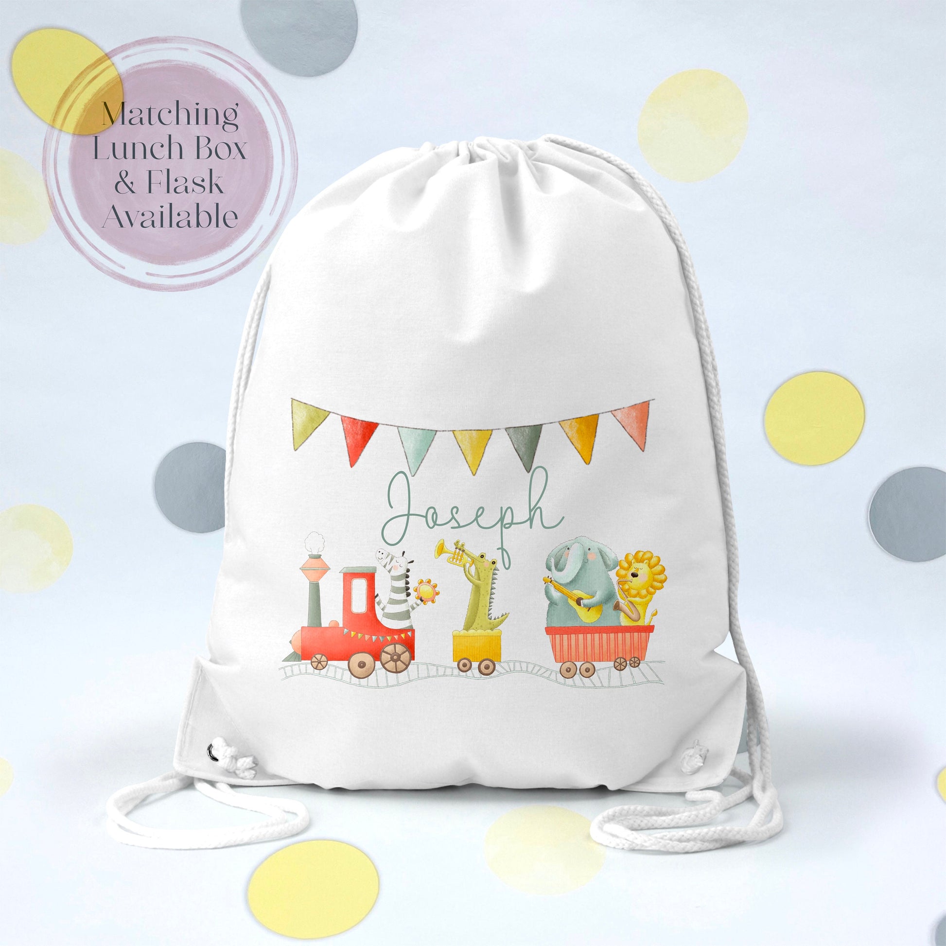 Image of a white PE bag with white drawstrings and a printed image to the front.  The image is of a cartoon train with animals in its carriages and bunting across the top. There is also the name Joseph across the middle.