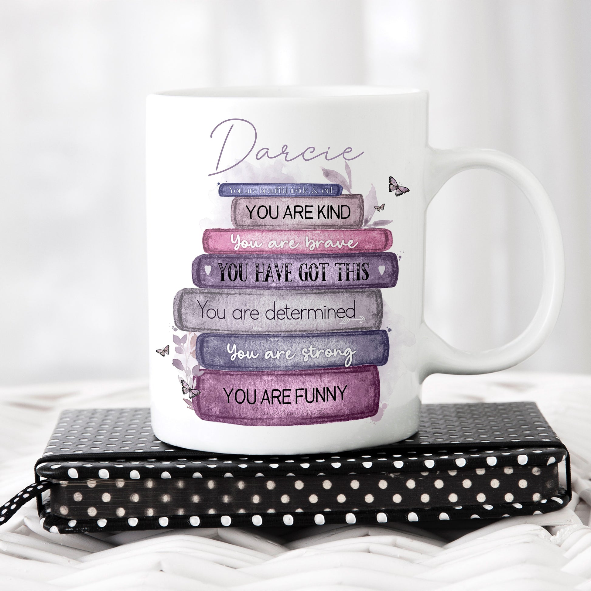 This is a watercolour book stack design of affirmations. These are uplifting words of empowerment for anyone that may need to hear them. This is all printed on an 11oz white mug and personalised with a name at the top.