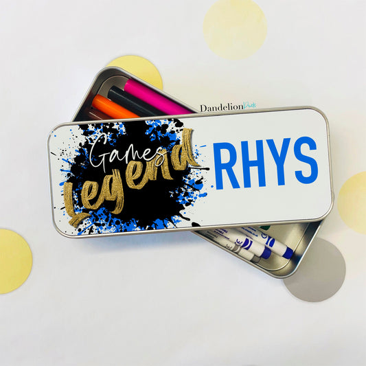 This is a great pencil tin for those that love gaming. The pencil tin is suitable for both pens and pencils. It is printed with a blue and black paint splash with games legend on top. It also has a name printed on it.