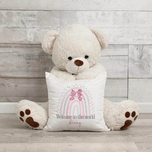 This cushion is printed with a lovely pastel pink and grey rainbow with a ribbon. ‘Welcome to the world’ is printed at the bottom of the rainbow along with the name of your recipient.  This is a lovely gift to welcome a new baby into the world.