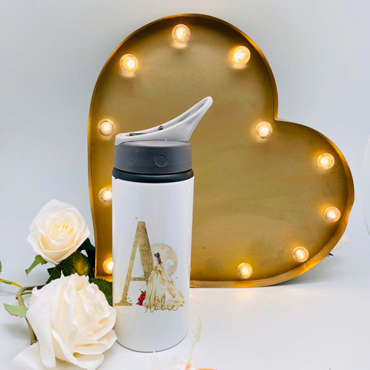 This is a beautiful Belle inspired design with a gold leaf initial. The princess is wearing a gold dress standing infront of an initial. The flask is 650ml with a flip up straw and carry handle.